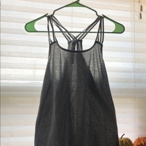 A grey tank top with mesh detailing